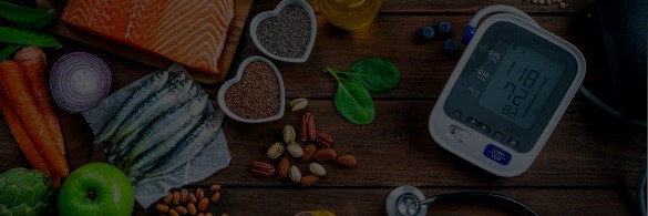 Heart-healthy vegetables and fish with a blood pressure monitor