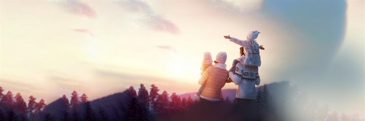 Family walking in the winter sunshine