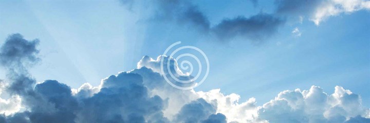 Blue sky and clouds with vata dosha symbol