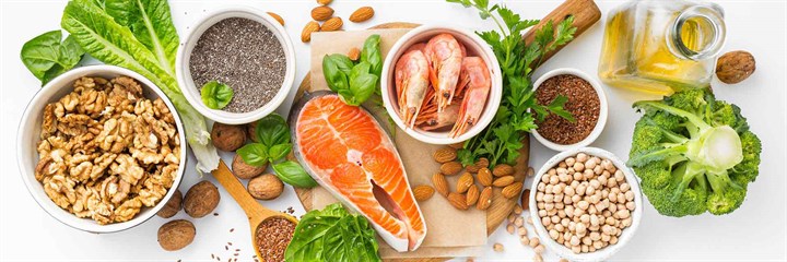 Overhead view of salmon, nuts and seeds