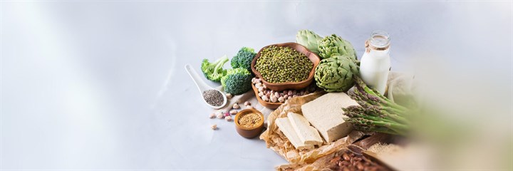 Spread of healthy foods including brocolli, asparagus and chia seeds