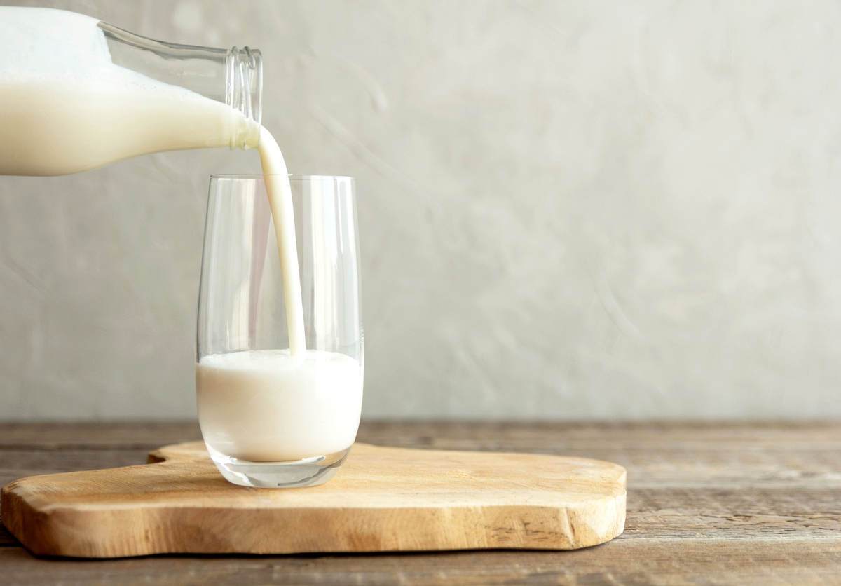 Pouring a glass of milk
