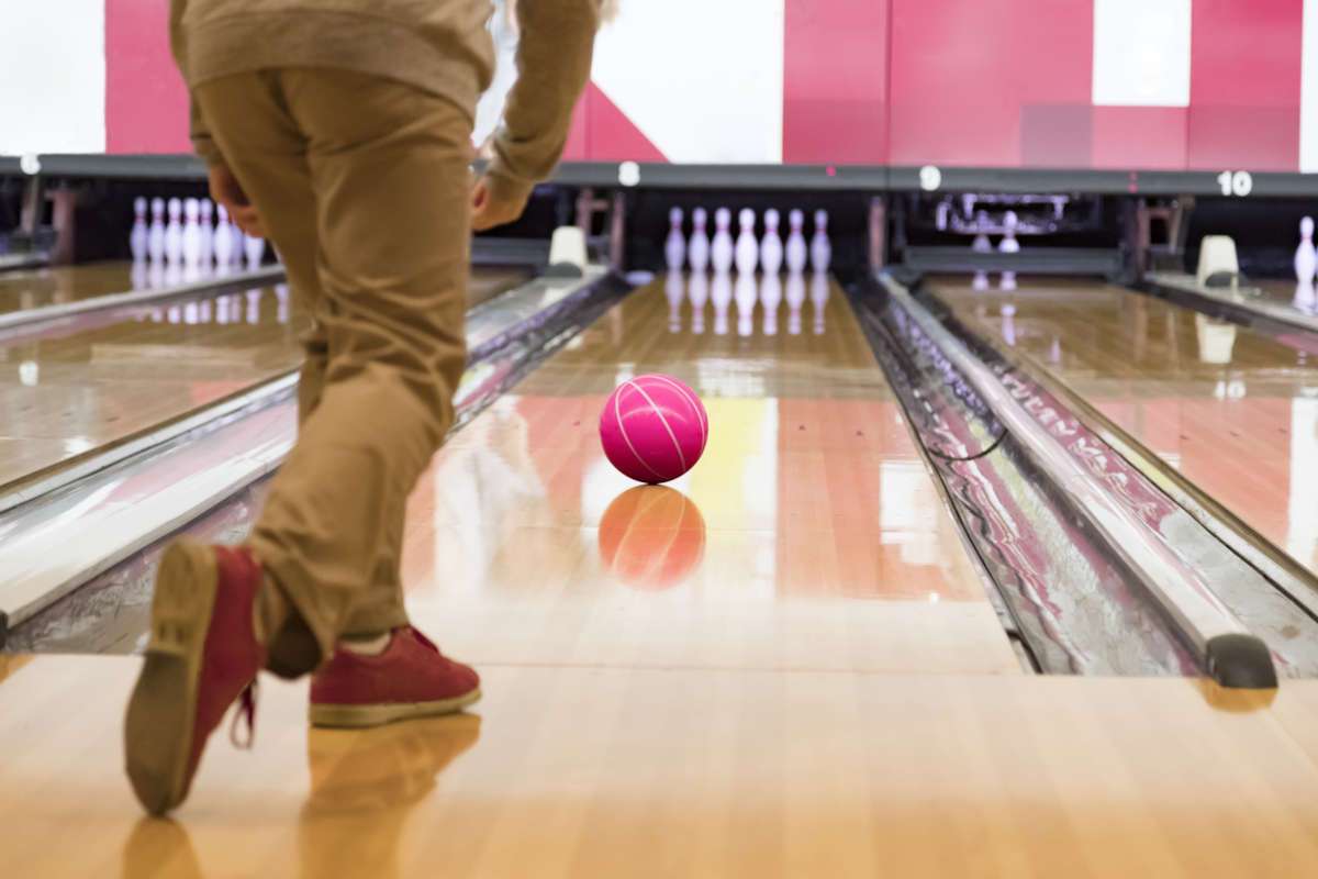 Rear shot of man bowling