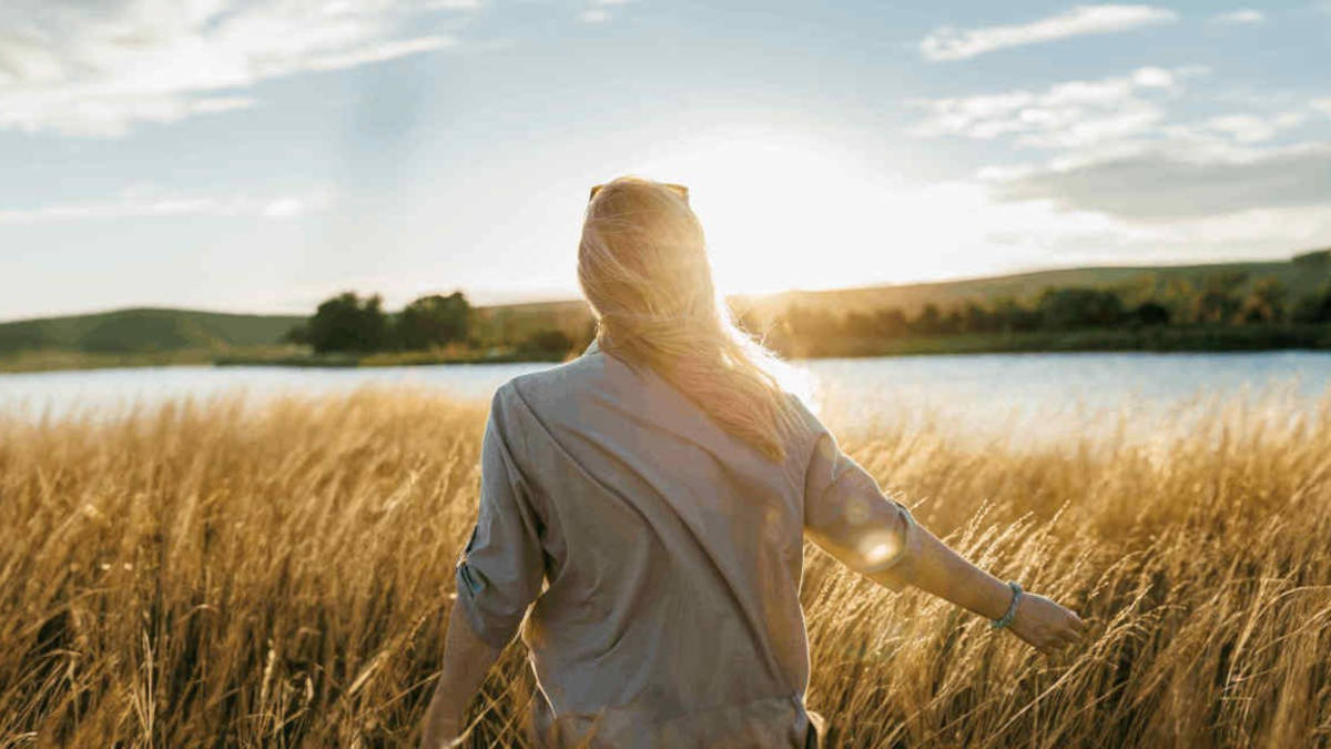 Woman outdoors in low winter sunlight